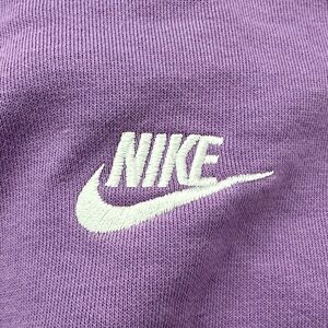 Girls size Medium, Nike Lavender Crewneck sweatshirt with White Logo like new